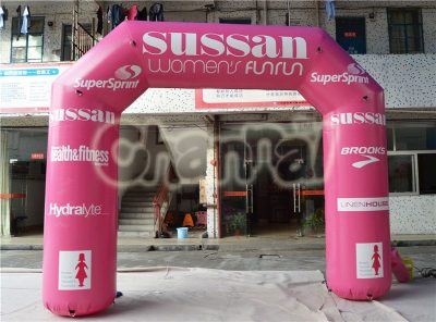 pink inflatable advertising arch for women's racing event