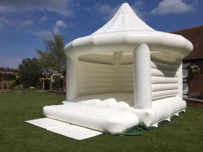 white bouncy house for wedding