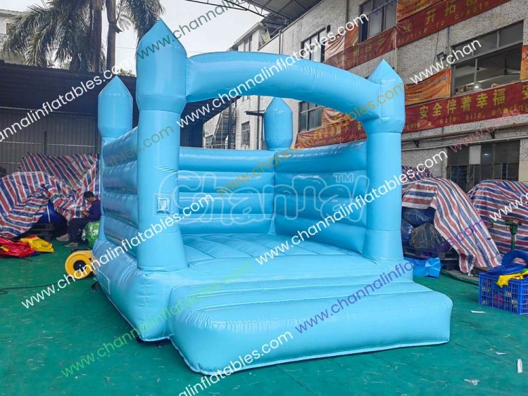 pastel blue wedding bouncy house for kids