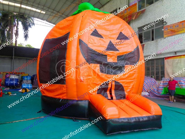 scary carved pumpkin bounce house