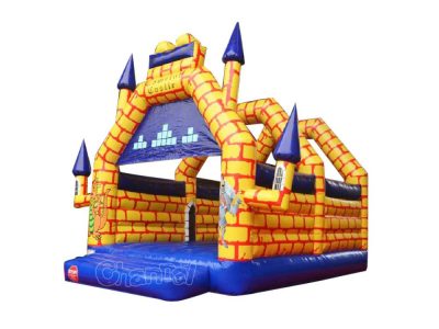yellow Camelot castle inflatable bouncer