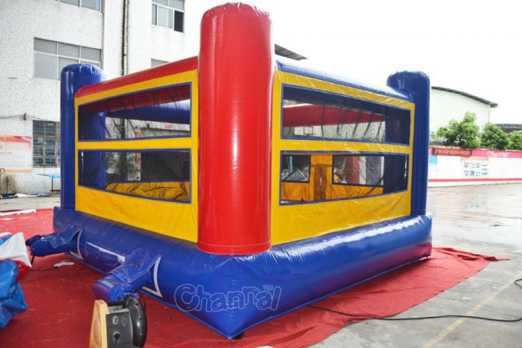 backside of blow up boxing ring and air blower