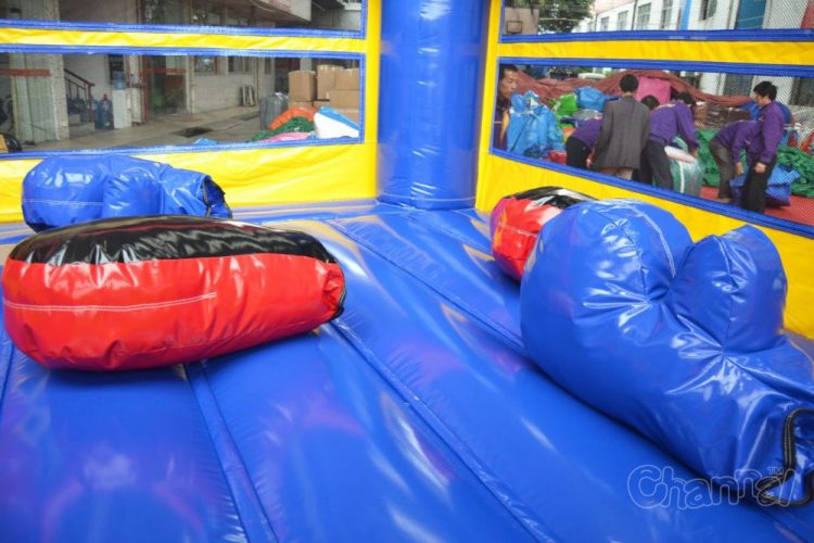 bouncy boxing mat and giant boxing gloves