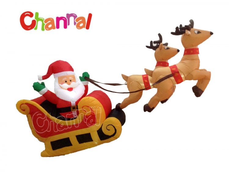 flying inflatable Santa Claus in reindeer sleigh