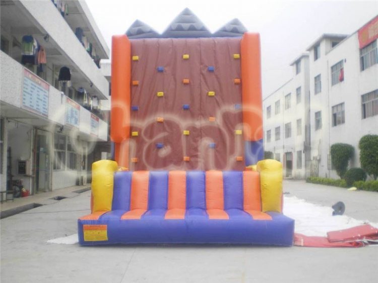 brown inflatable climbing rock wall