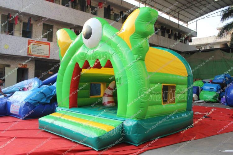 one eyed green monster inflatable jumper