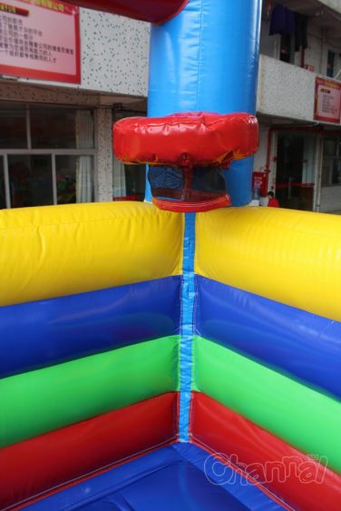 inflatable basketball hoop in bouncy castle