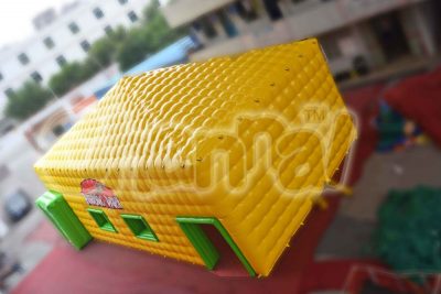 yellow inflatable cube tent
