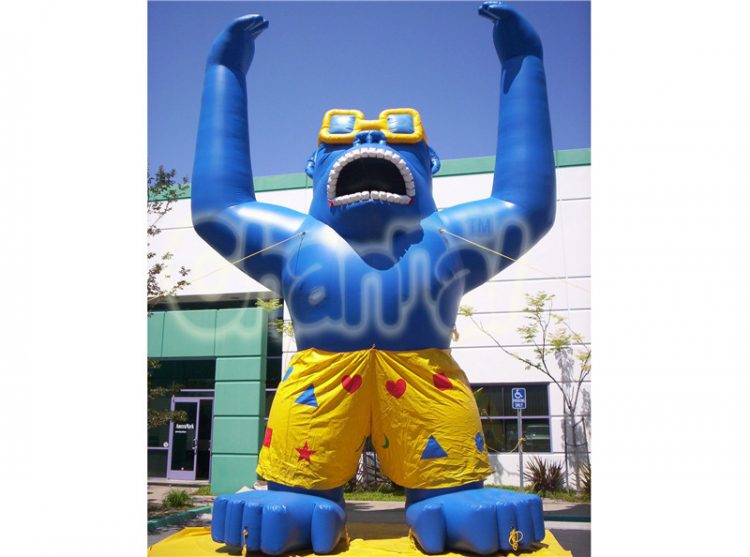 giant Inflatable Gorilla with cool sunglasses and board short