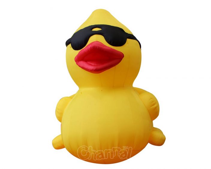 yellow giant inflatable duck with cool sunglasses