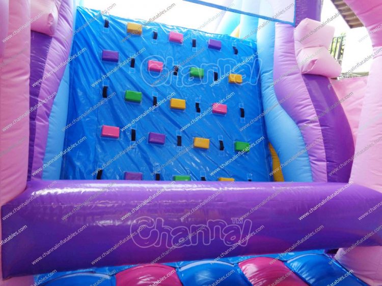 climbing wall inside the unicorn inflatable course