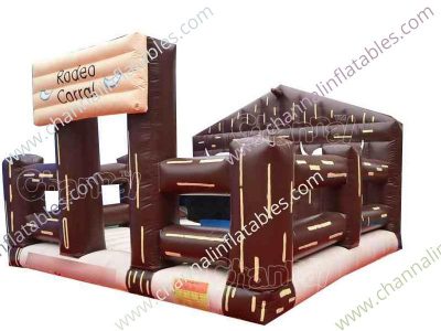 inflatable rodeo bull arena with bull riding machine and bounce house