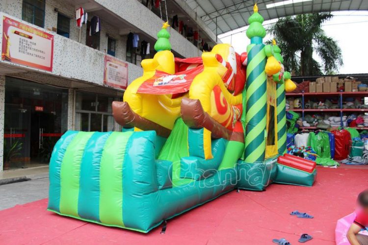 Christmas tree bounce house with slide