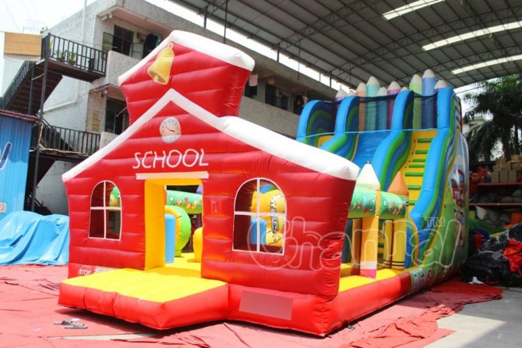 red school house inflatable slide