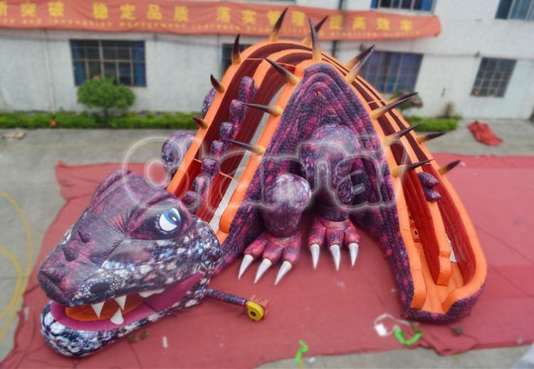 purple dinosaur inflatable slide