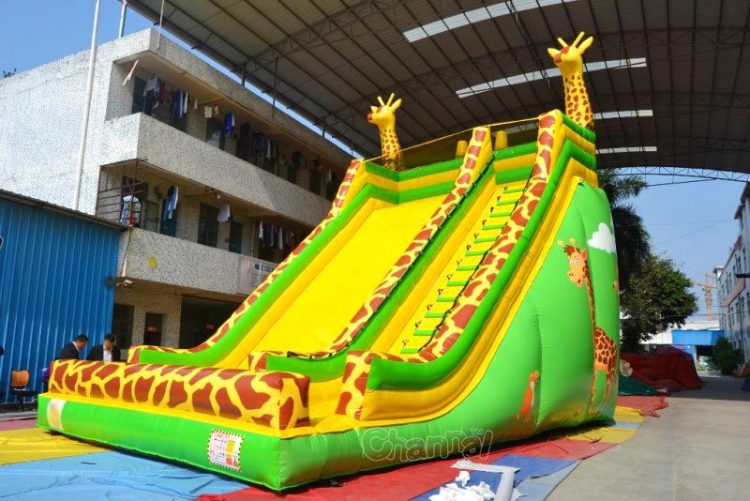 yellow green giraffe inflatable slide