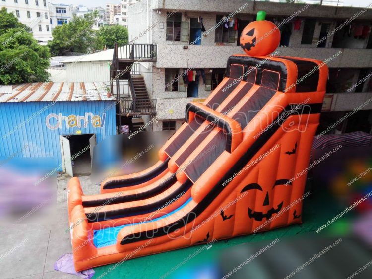 orange inflatable pumpkin slide