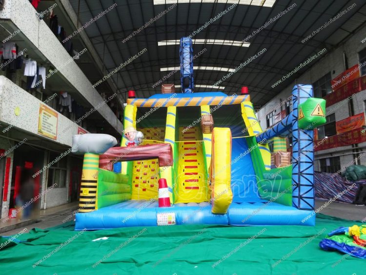 construction dry slide with climbing wall