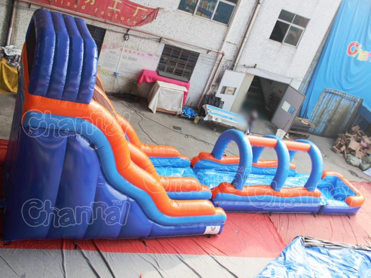 blue orange water slide with slip lane