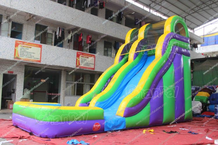 green purple yellow inflatable water slide