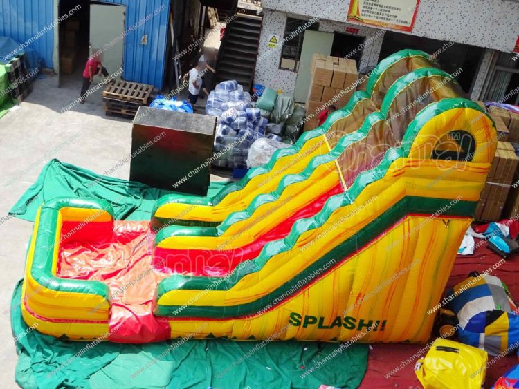 yellow green fiesta water slide with pool