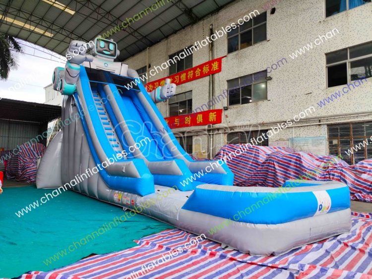 silver and blue robot theme water slide