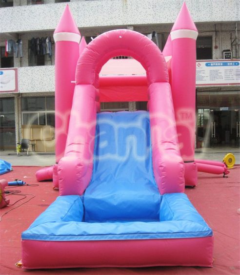 pink bouncy castle with pool