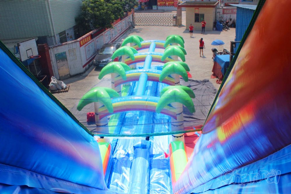inflatable water slide with palm trees
